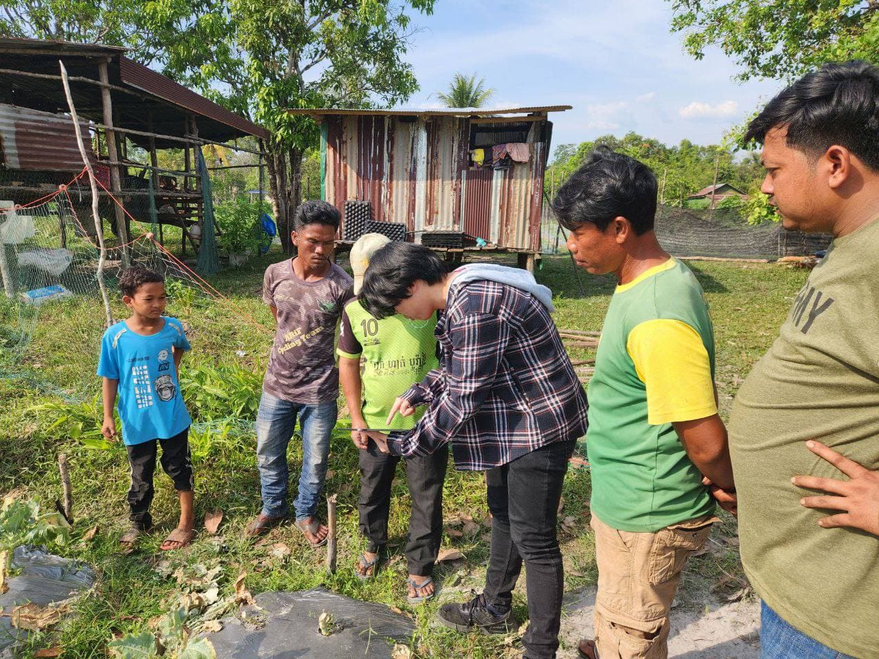 Save Crops team testing the bot with farmers in Kampot